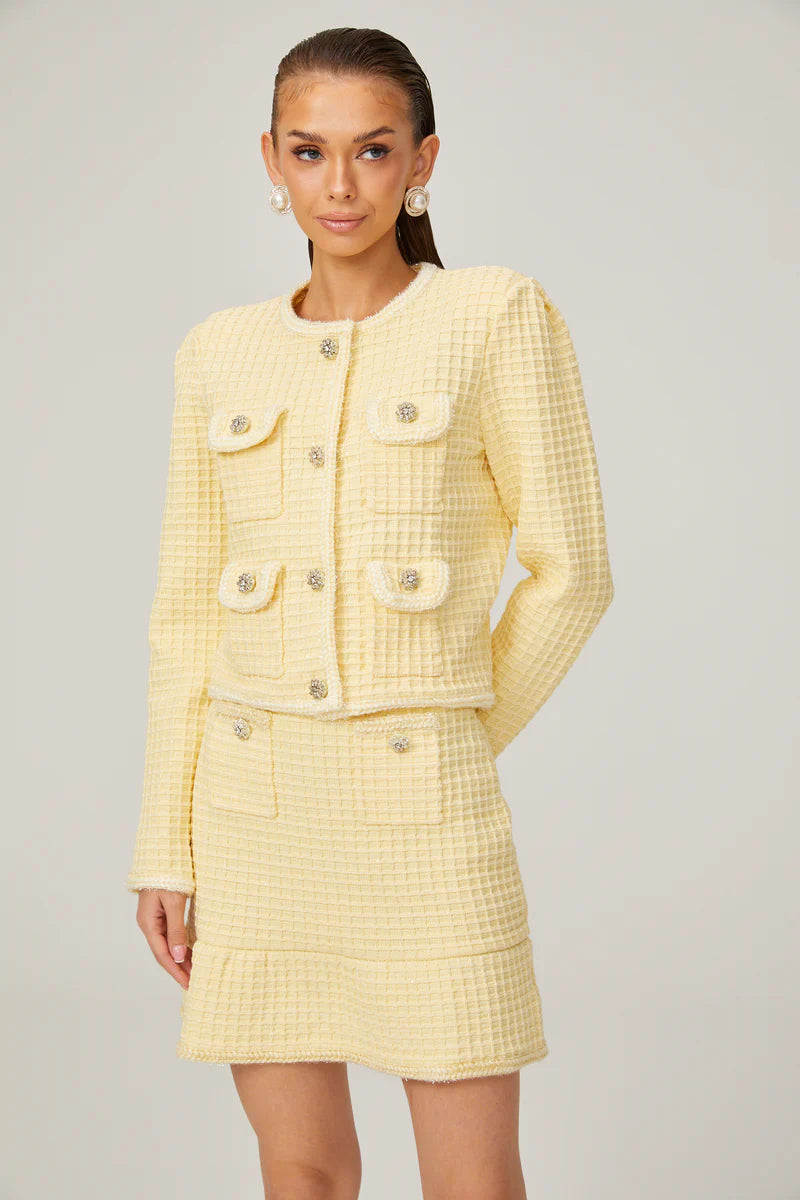 Veste et jupe en tricot jaune de Fabienne Ensemble de correspondance