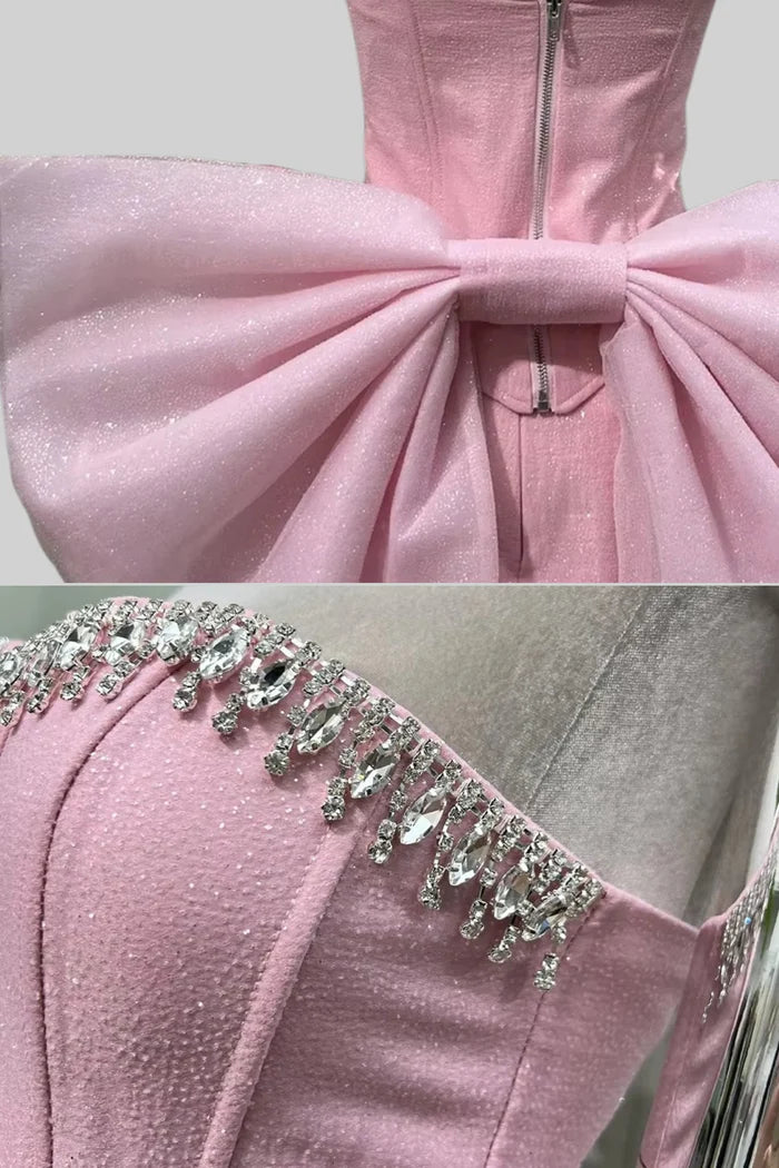 Mini robe corset avec arc arrière surdimensionné - rose