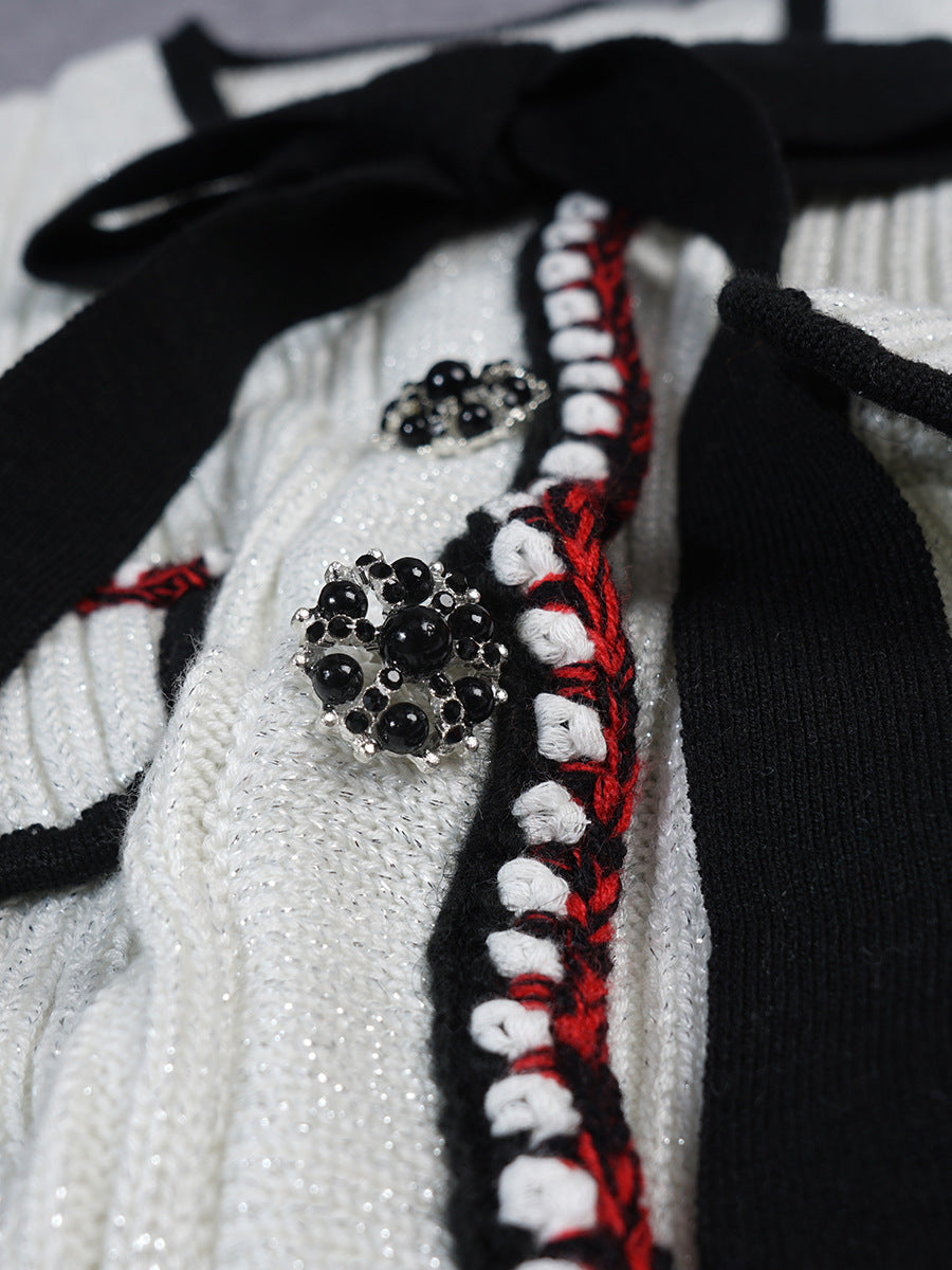 Gürtelbogen -Strickkleid