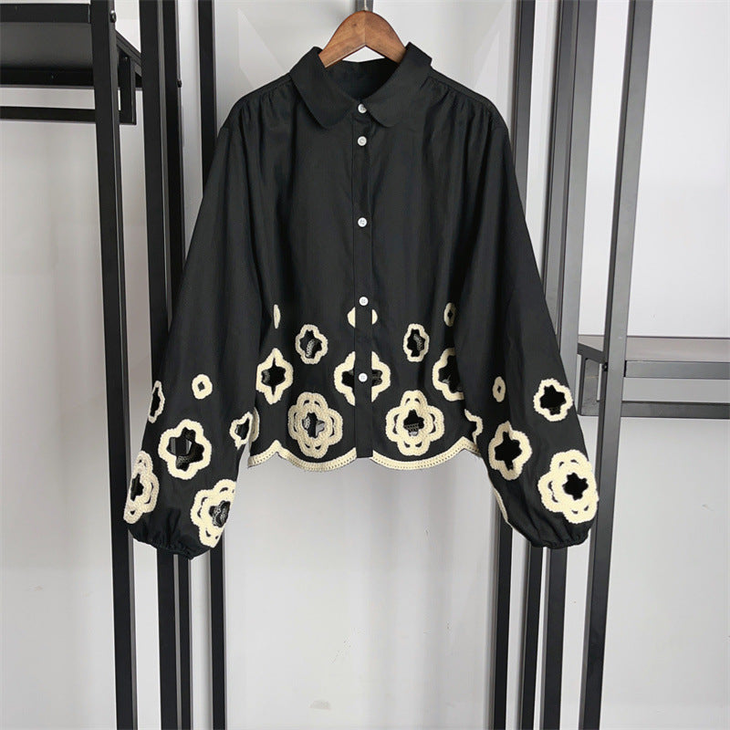 Ensemble haut à découpes fleuries et pantalon évasé