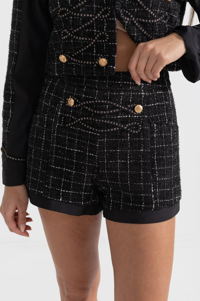 Ensemble en tweed à deux pièces avec motif carré et détails en or - noir