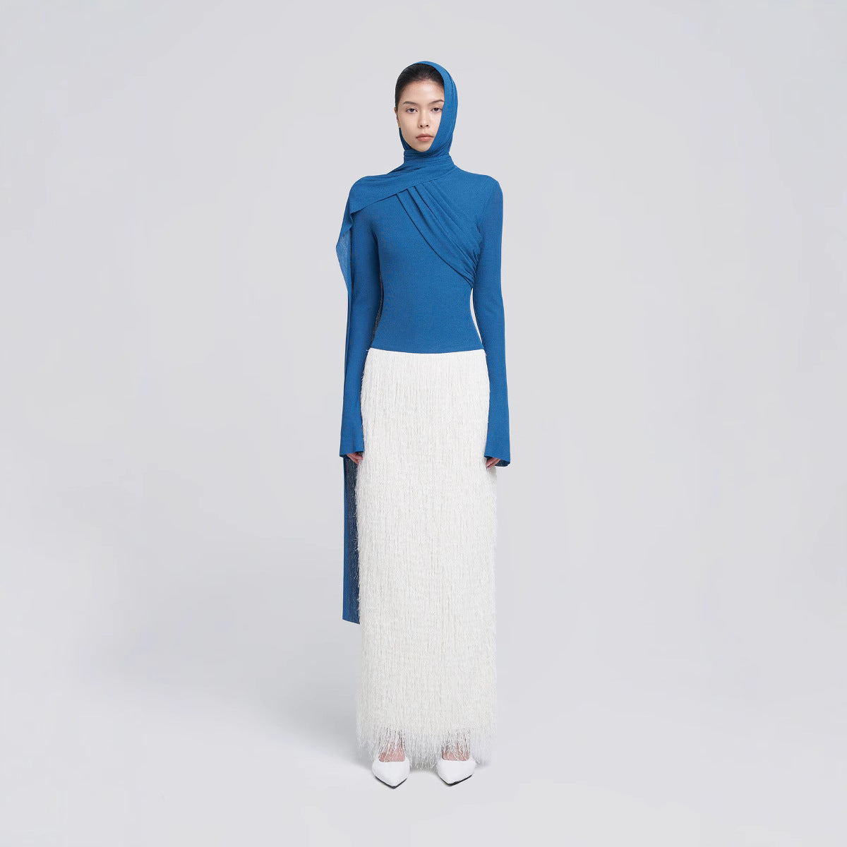 Waist hooded top tassel long skirt