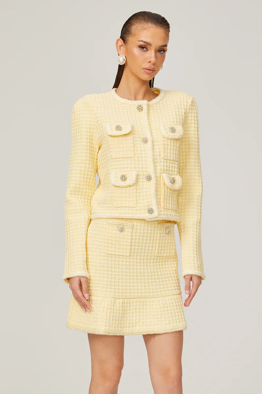 Veste et jupe en tricot jaune de Fabienne Ensemble de correspondance