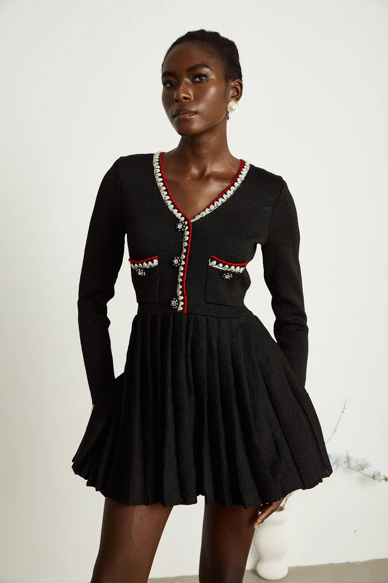 Auille tricotée de mini robe plissée