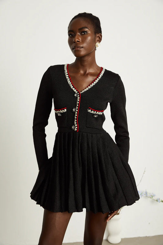 Auille tricotée de mini robe plissée
