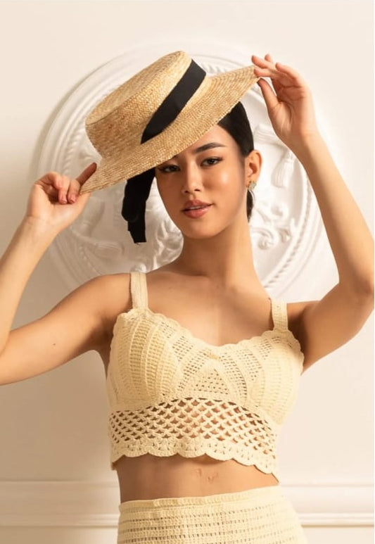Wide-Brimmed Straw Hat With Black Ribbon Accent