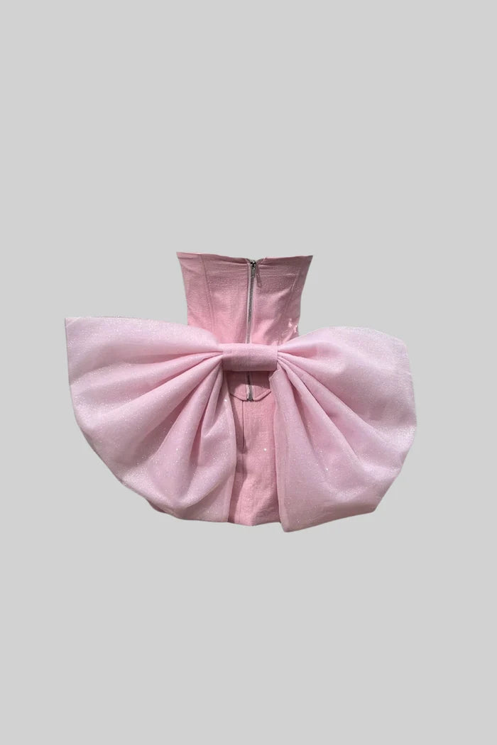 Mini robe corset avec arc arrière surdimensionné - rose