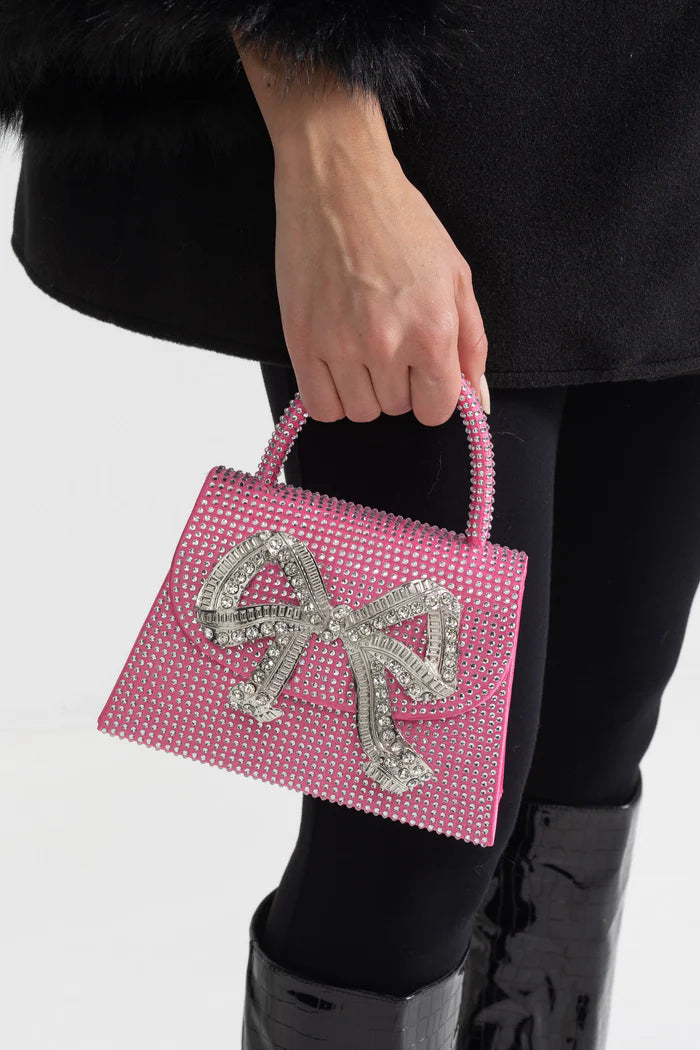 Funkelnde Strasskupplung mit dekorativem metallischen Bogen - Pink