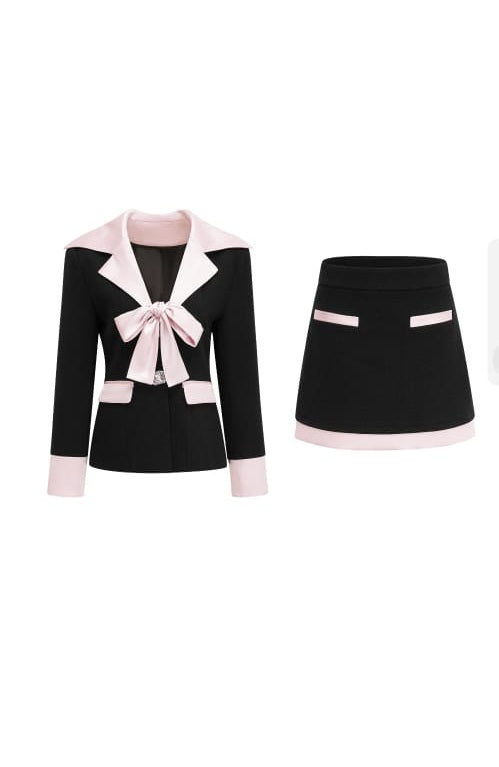 ENSEMBLE DE VESTS ET DE JUPT UAINE BLACK