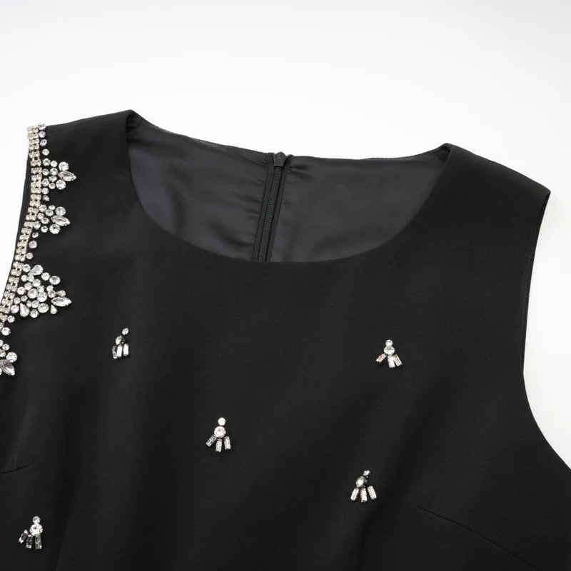 Robe découpée noire de la médée