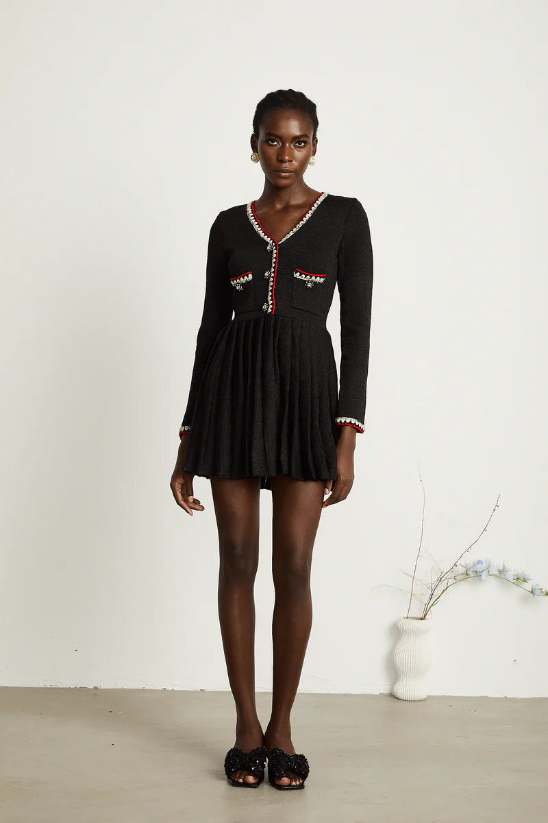 Auille tricotée de mini robe plissée
