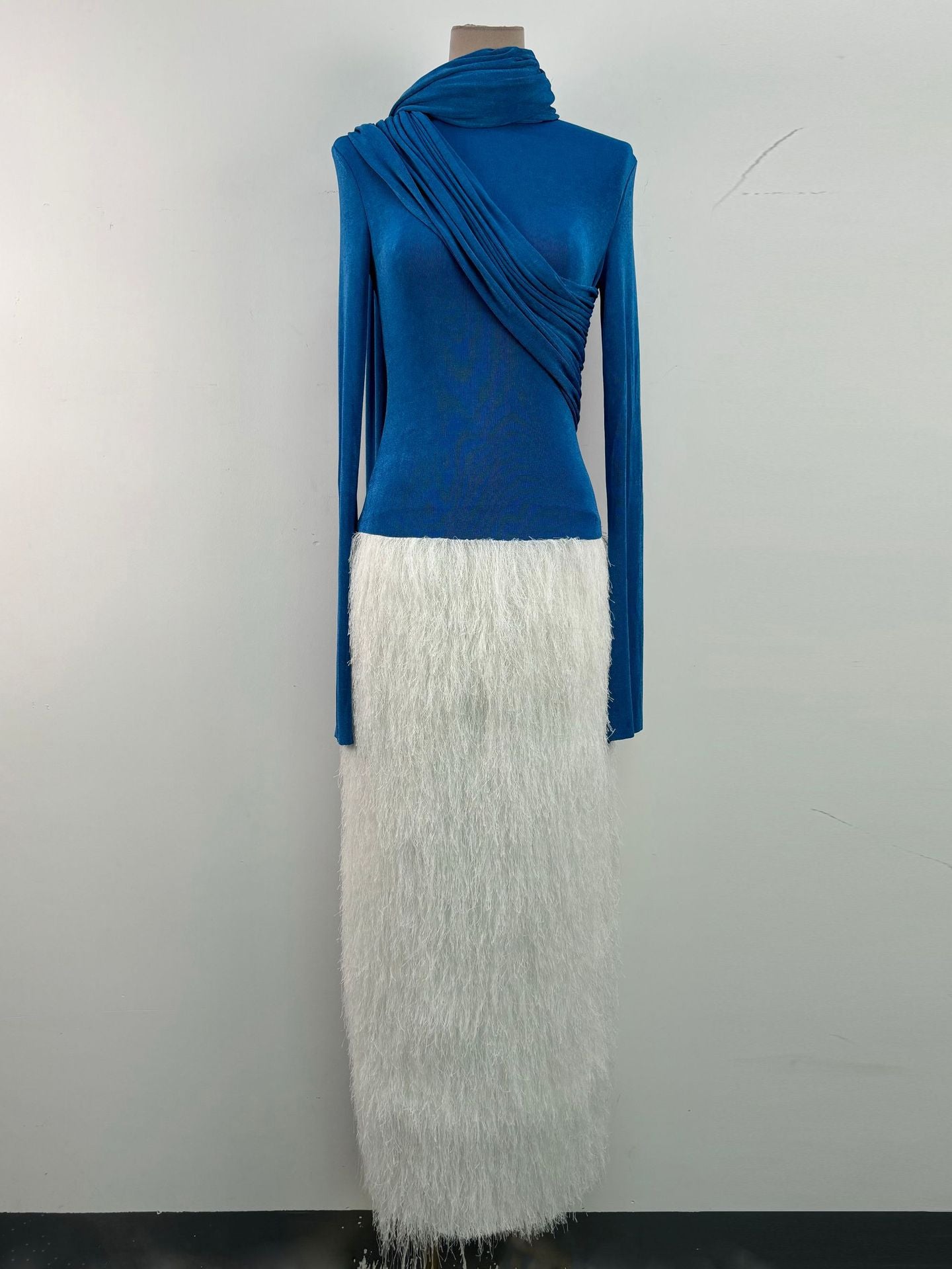 Waist hooded top tassel long skirt