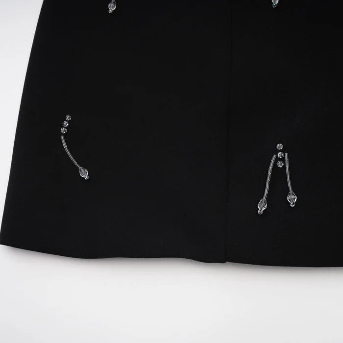 Babette Mini robe noire ornée de cristaux