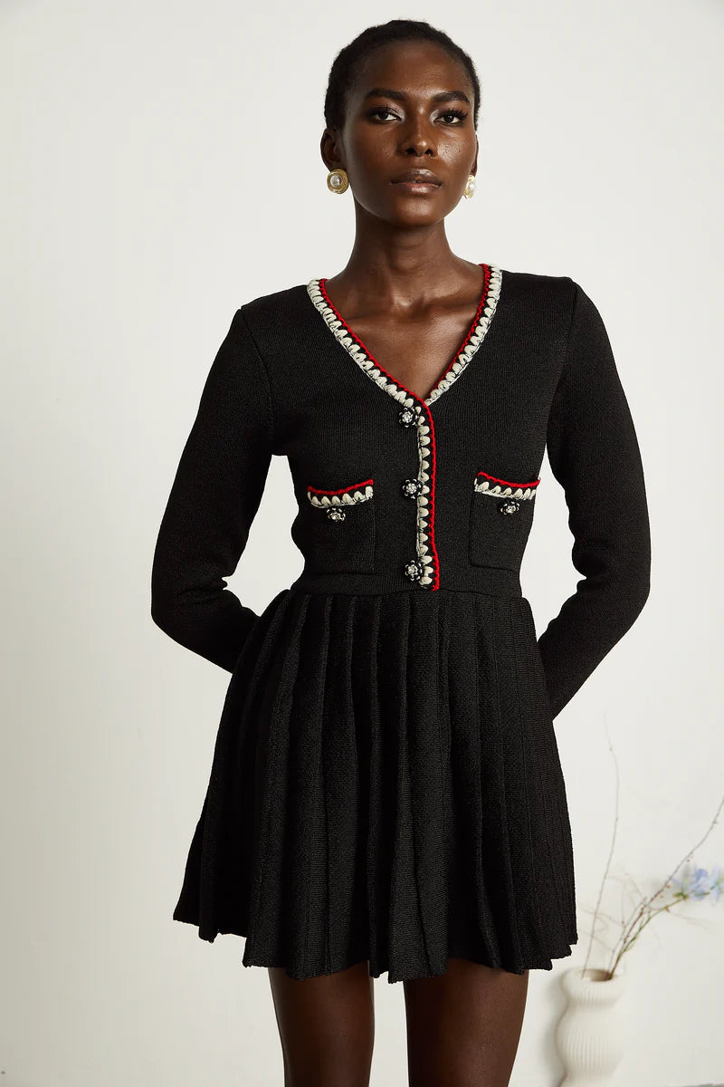Auille tricotée de mini robe plissée