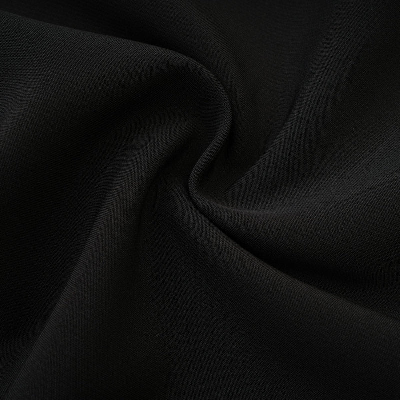 Robe découpée noire de la médée