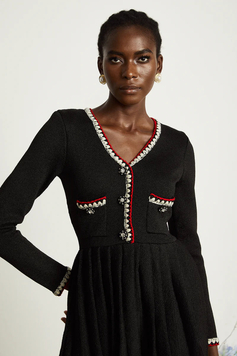 Auille tricotée de mini robe plissée